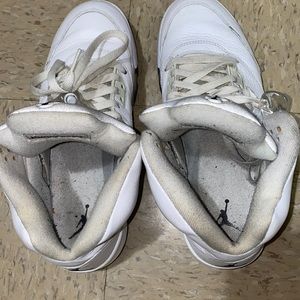 These are Men Air Jordan 5 Retro 'Metallic White' . They’re in great condition.